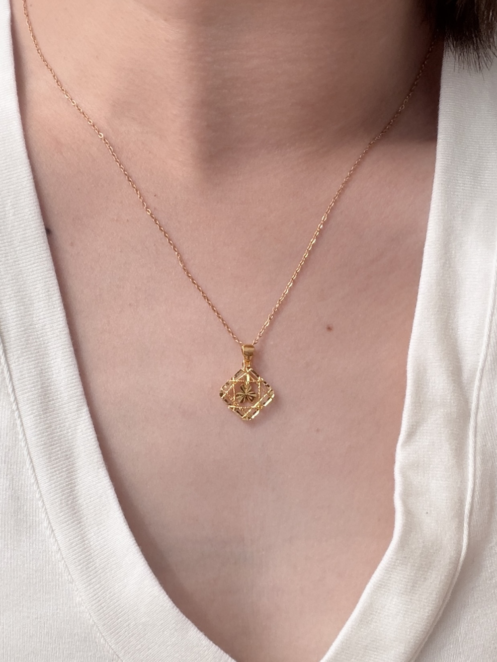 Square Filigree Lucky Clover Pendant — 24K Pure Gold (On model)