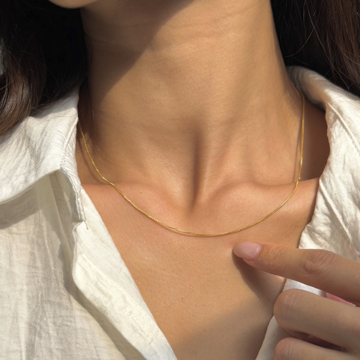 Box Chain Necklace — 24K Pure Gold (On model)