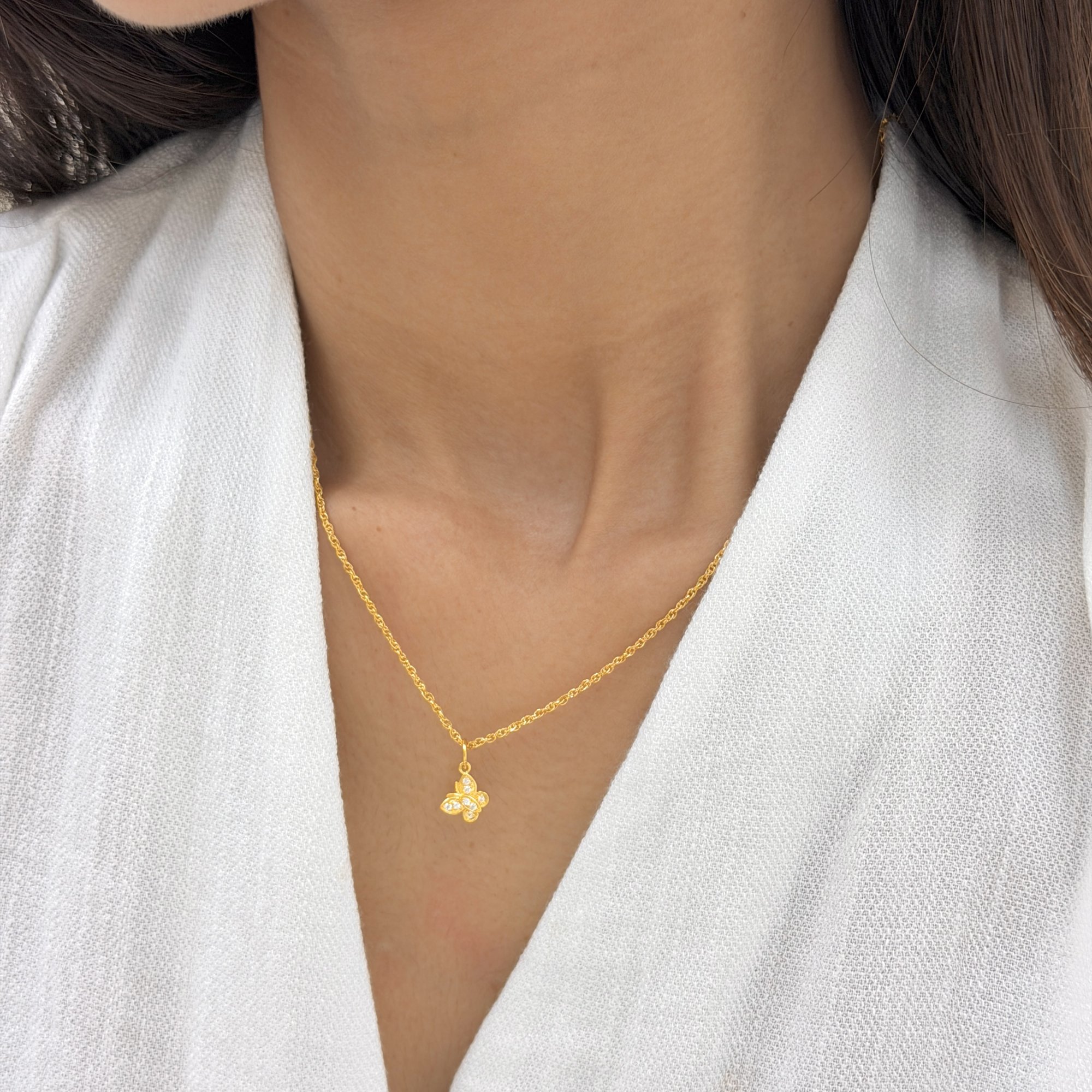Zircon Butterfly Pendant — 24K Pure Gold (On model)